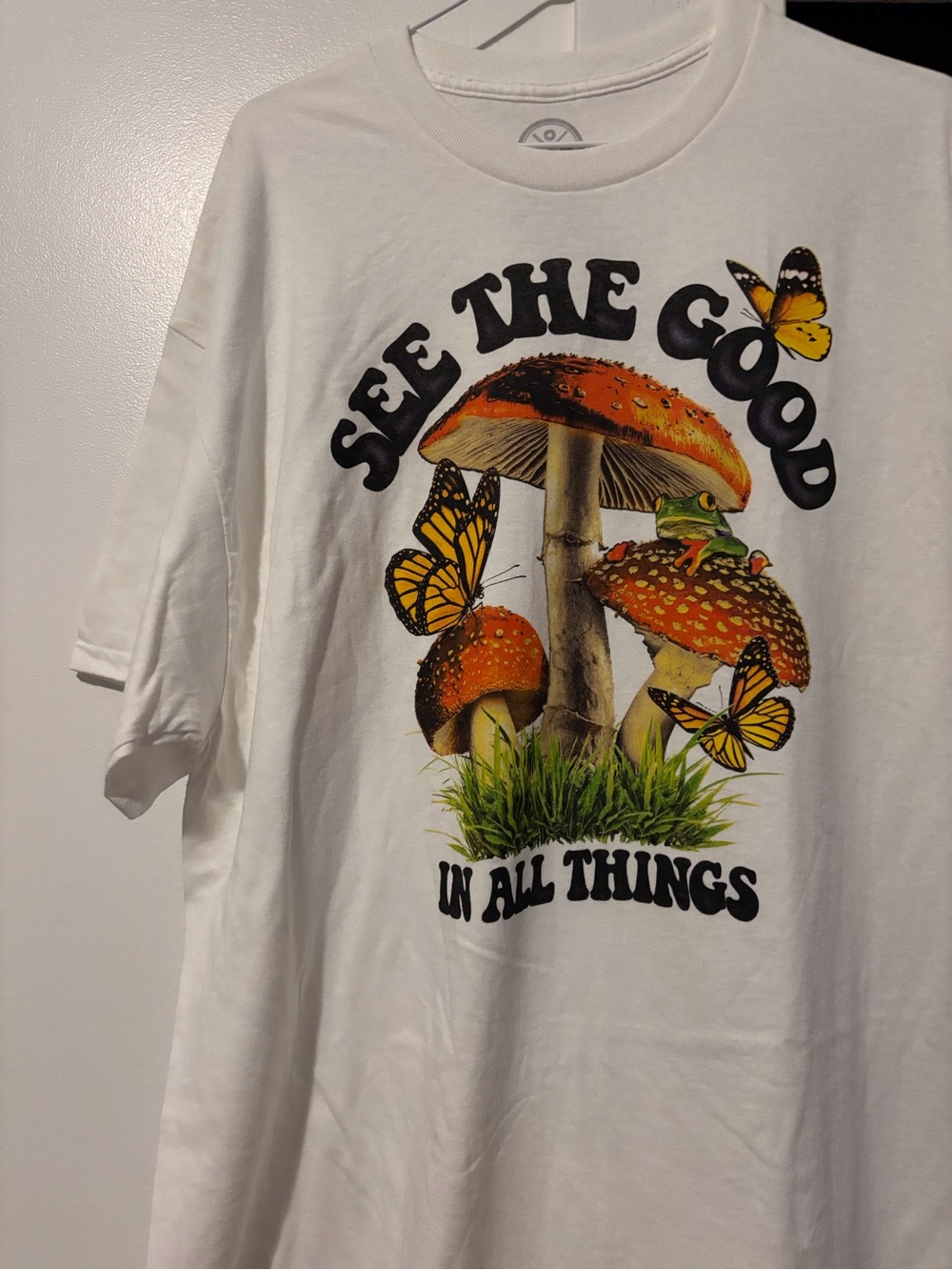 See The Good White Graphic Tee with Mushroom & Butterfly Design